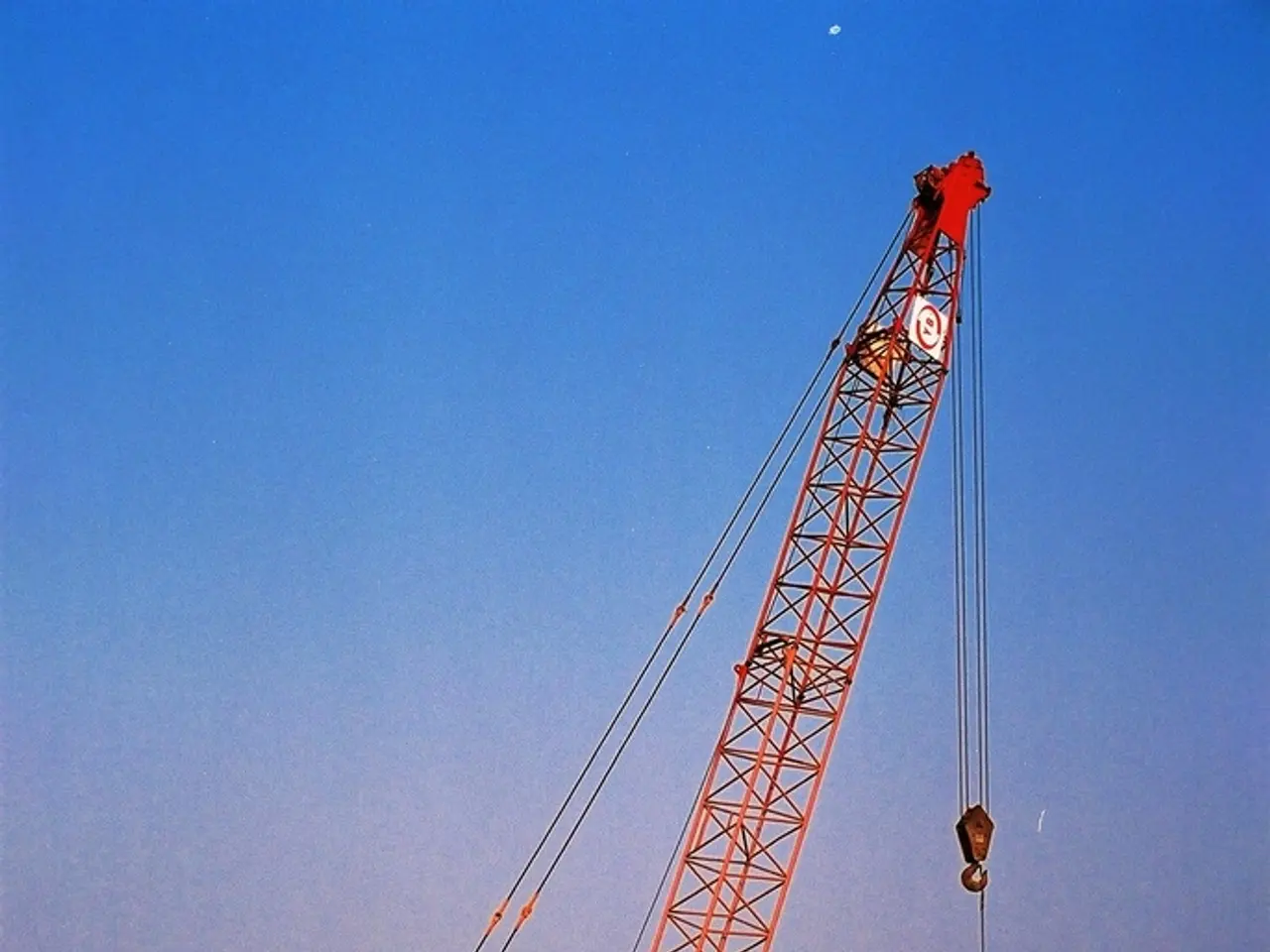 Stunning manor located in a picturesque, unusual British hamlet, featuring a window reminiscent of...