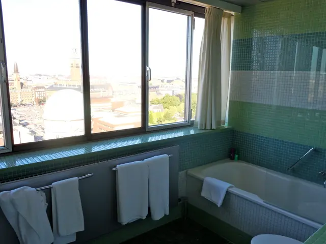 Transformed bathroom from dull to cozy with terracotta tiling, marble highlights, and wooden...