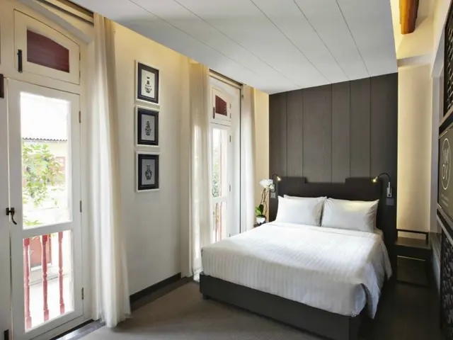 Cozy and Elegant Swedish Residence featuring Slanted Ceiling Design