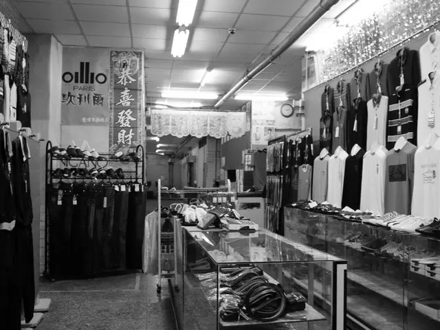 In this image there are clothes and there are belts. On the right side there are footwear's. In the...
