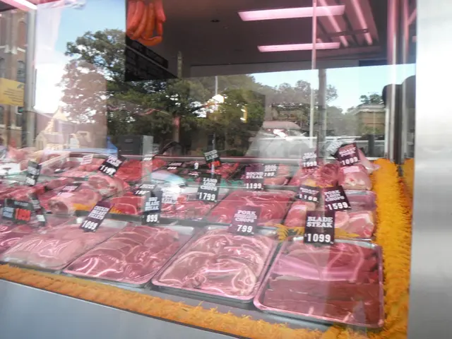 In this picture, we see glass from which we can see the trays containing the meat. We even see the...