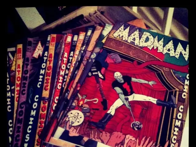 In this picture we can see some books, there is some text on these books, we can see cartoon images...